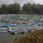 Sunday 27 October with Adigemarathon. Hundreds of canoes, kayaks and rafts on the Adige River